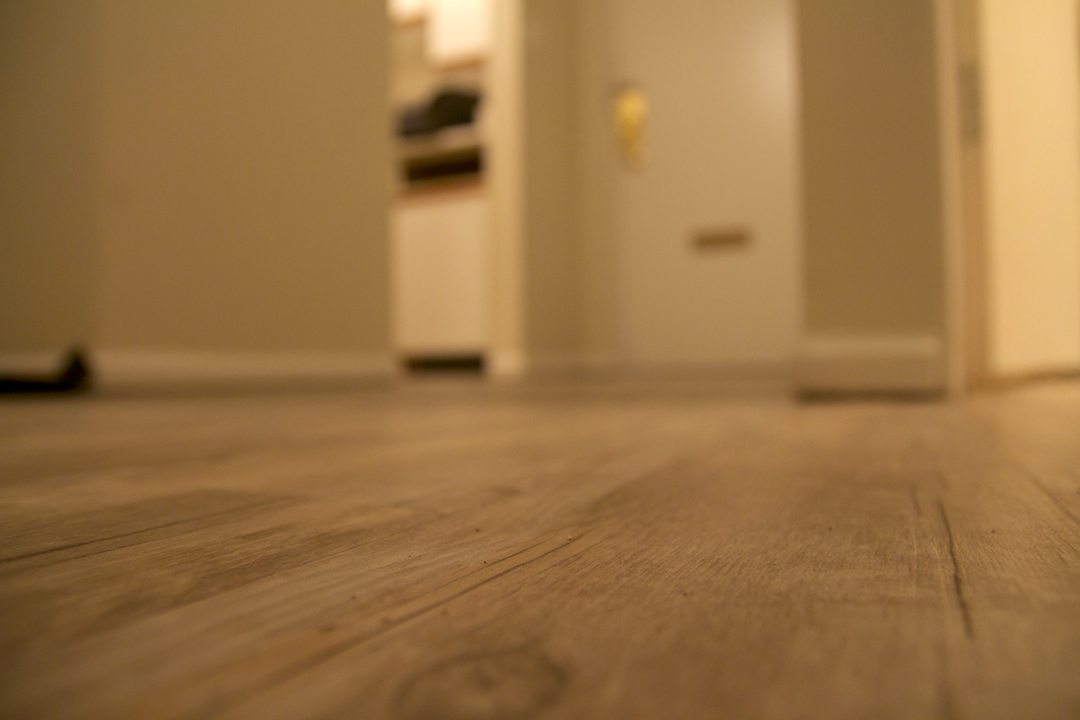 finished the vinyl flooring in a hallways Carpet, Laminate, Vinyl