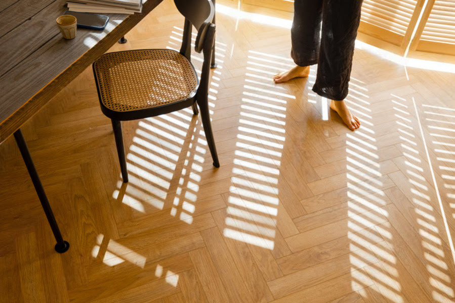 The Refined Elegance of Herringbone Pattern Hardwood Floors